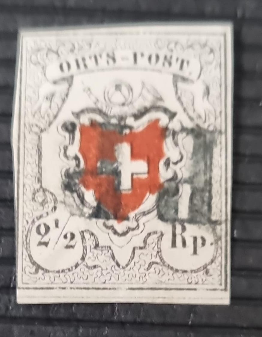 Ortspost  mit Kreuzeinfassung